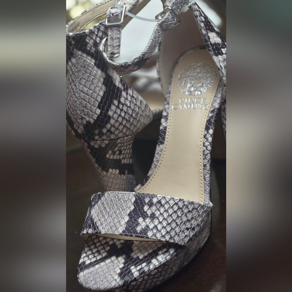 Vince Camuto Snake Skin print 4" heels open toes with ankle strape, size 6.